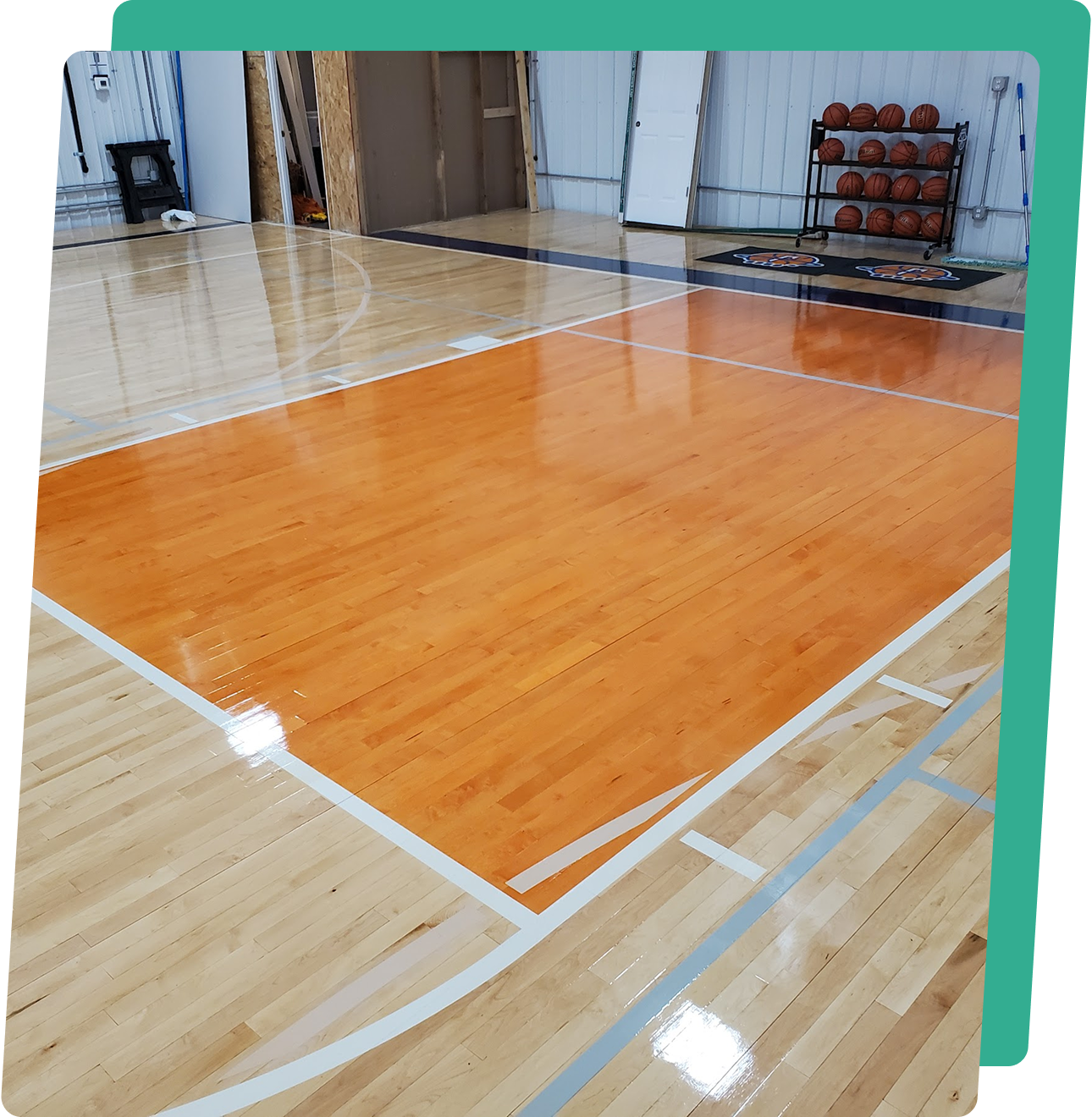 image1 A basketball court with the floor painted orange.