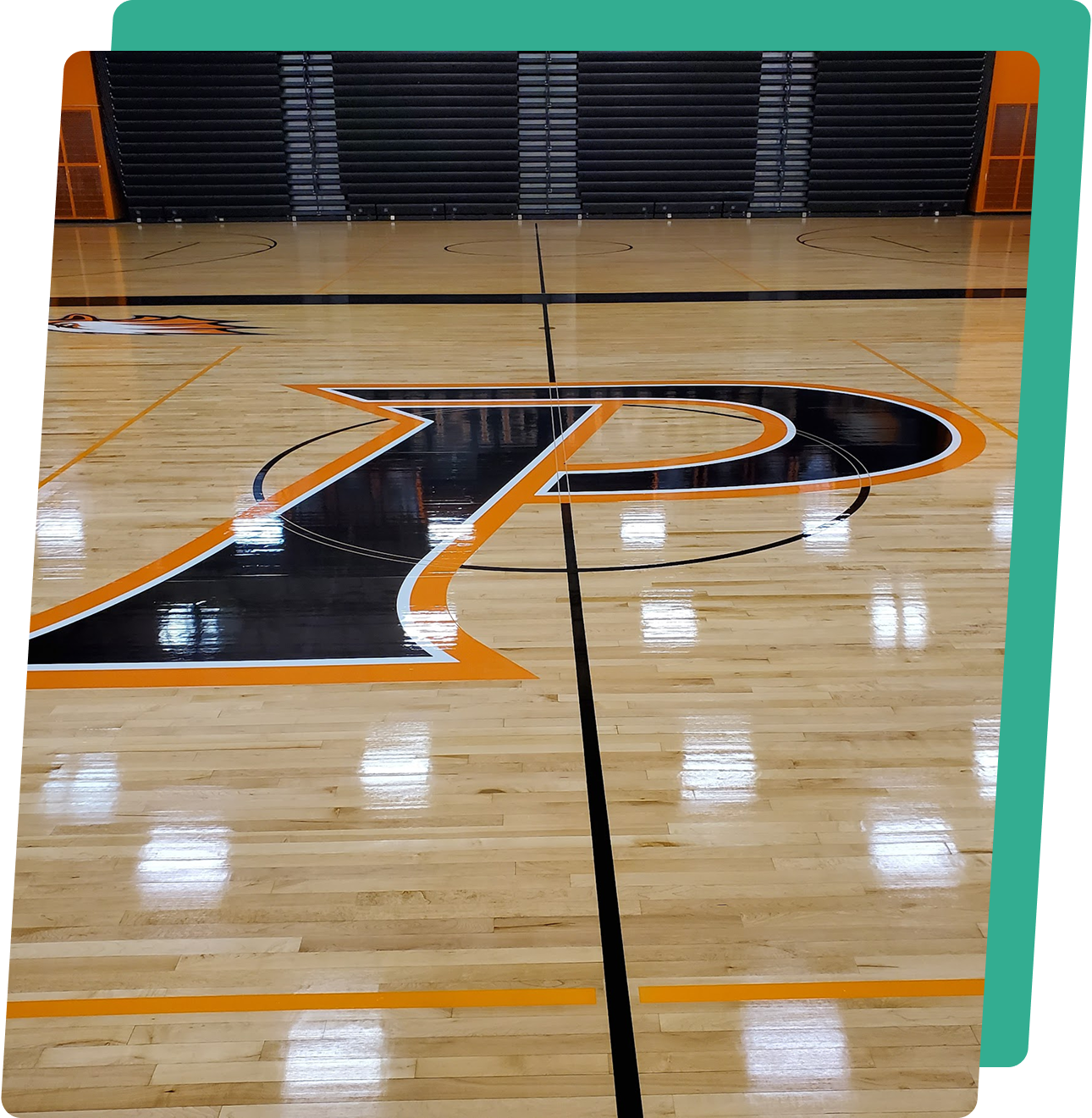 image2-5 A basketball court with the letter p painted on it.