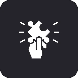 A hand holds a puzzle piece, with lines radiating from it, against a dark background.